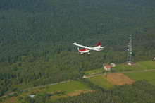 Ultralight Aircraft Flying Over The Forest