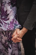 © Nastia - Art photo. The couple holds the hand. Photo details.