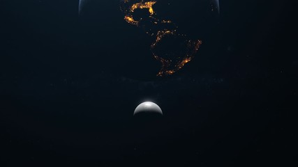 Wall Mural - the moon and the earth move in space the earth in the foreground at the top of the image