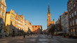 The Main Town Hall at Long Market Street on Royal Route in Old Town of Gdansk, Poland. Spring, sunrise.