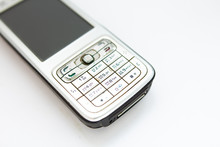 Old Push-button Smartphone On A White Background