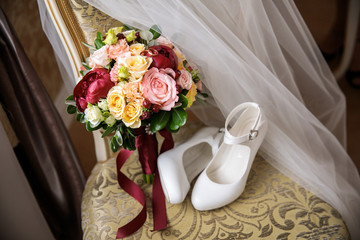 Wall Mural - composition of a bride’s bouquet, shoes and veils
