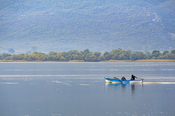 Fishing boat in blue lake  Golyazi Village of Turkey