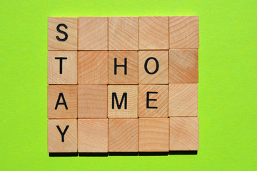 Canvas Print - Stay Home, words in wooden alphabet letters 