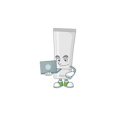 Canvas Print - Diligent white plastic tube mascot design style working from home with laptop