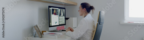 Caucasian female doctor delivering telemedicine consultation to a patient. Telehealth, telemedicine, remote consultation service. Coronavirus, COVID-19