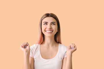 Wall Mural - Happy woman with healthy teeth on color background