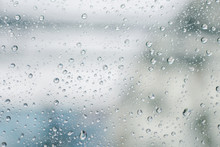 Full Frame Shot Of Wet Glass Window During Rainy Season