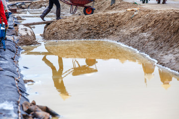 salt farmer on salt field Long Dien, Ba Ria Vung Tau, Vietnam.