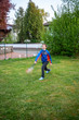 © Jesus - Boy plays badminton in his backyard during the coronavirus lockdown measures