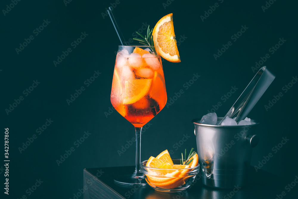 Aperol Spritz cocktail, orange slices and ice bucket Stock Photo ...