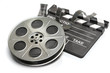 Film reel with clapper board. Video, movie and cinema production concept.
