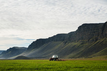 Tractor On Farmland In The Westfjords, Iceland, Scandinavia, Europe