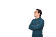 © 1STunningART - Side view contented businessman, keeps arms crossed, looking ahead as talking to someone isolated on white background with copy space. Joyful business worker, wearing glasses, open mouth speaking.