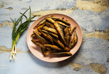 Fototapeta Sypialnia - Fried herring on a plate