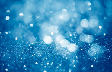 Wall Mural - blue defocused glitter background with copy space