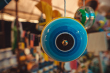 Close-up Of Toys Hanging For Sale At Store