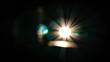 © Peter Dinyesi - Bright lens flare out of focus with small coloured bokeh.