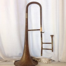 Old Trombone By Curtain At Home