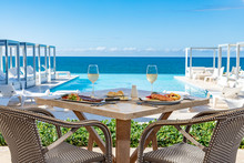 Oceanfront Restaurant Table, Pool And Ocean Background, Food And Drinks, Bread And Butter