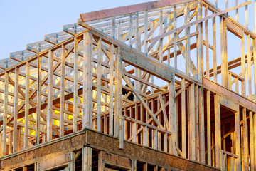 Canvas Print - New home construction framing of a house under construction