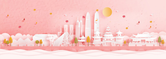 Wall Mural - autumn in shenzhen, china with falling maple leaves and world famous landmarks in paper cut style ve