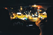Person Driving Car At Night