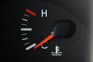 The car's coolant temperature indicator on the dashboard, a little color, shows the minimum temperature.