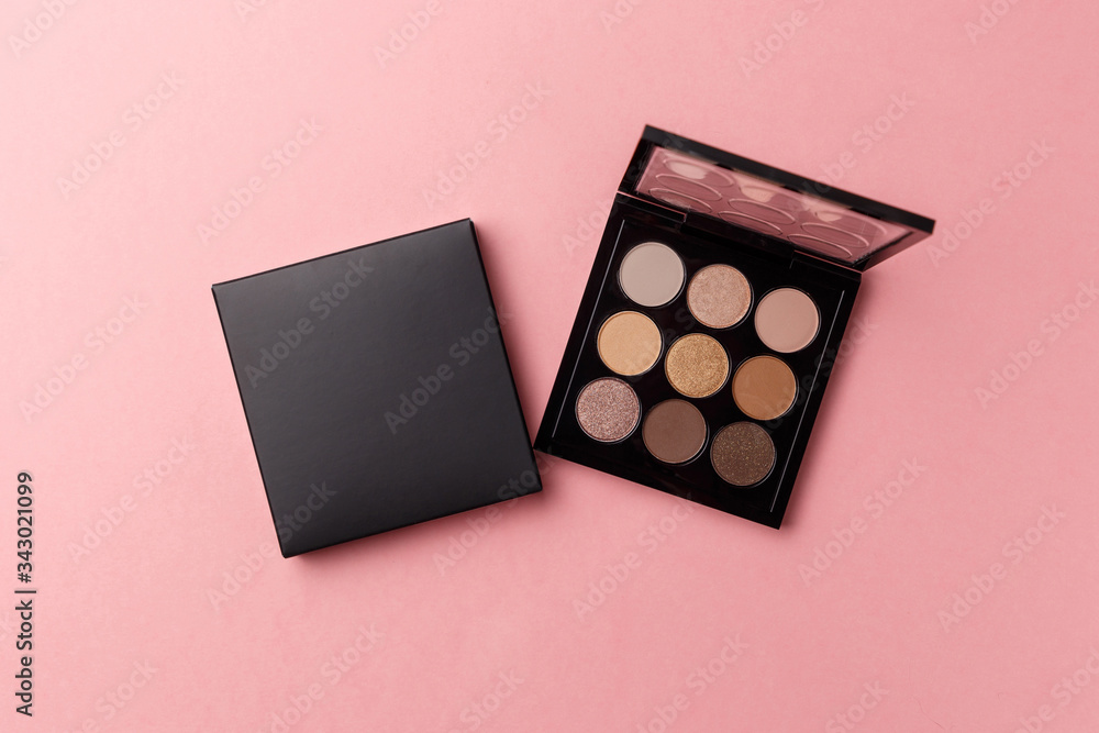 Mua and girly concept. Eyeshadow palette on pink background, eye shadows cosmetics product as luxury beauty brand promotion. Fashion blog design. Contouring palette. Makeup palette close up - obrazy, fototapety, plakaty 