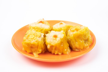 Wall Mural - Siu Mai - Chinese steamed pork dumplings on plate isolated on white background.