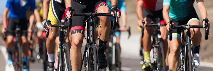 Poster - Cycling competition,cyclist athletes riding a race, the peloton climbing the mountain