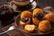 Homemade cottage cheese balls, hungarian sweet dessert served with berry jam.