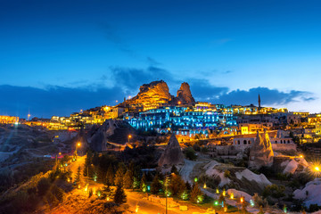 Wall Mural - Uchisar Castle at night in Cappadocia, Turkey.