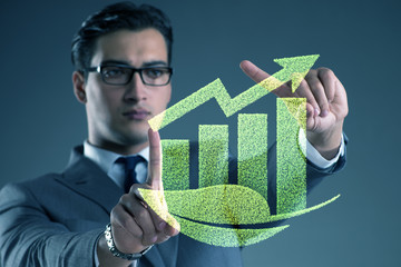 Green economy growth concept with businessman