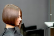 © okskukuruza - Woman with short hairstyle in hair salon with copy space.