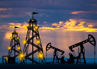 Wall Mural - Oil production. Drilling rigs on the background of the sky. Petroleum and gas field at night. Exploratory drilling in petroleum fields. Oil rigs in place of wells. Concept - oilfield development