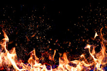 Flames Of Fire On A Dark Background. Copy Space, Place For Text.