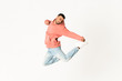 © luismolinero - Man dancing street dance style over isolated white background