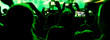 Silhouettes of a people hand shooting the concert with mobile phones
