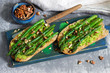 © Janna - Vegan whole grain bread sandwich with asparagus, pea puree, nuts and soy sauce.
