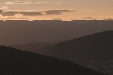 Wall Mural - Evening landscape with Layers of mountain.