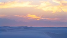 Timelapse Time Lapse Of White Sands Dunes National Monument And Organ Mountains With Soft Pastel Twilight Sunset In New Mexico Horizon And Colorful Yellow Sky 