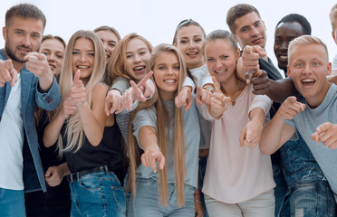 Wall Mural - group of young like-minded people pointing at you