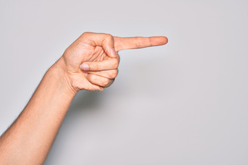 Hand of caucasian young man showing fingers over isolated white background pointing with index finger to the side, suggesting and selecting a choice