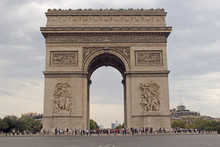 People In Front Of Arc De Triomphe Against Sky