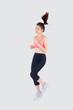 © NT_studio - Beautiful young asian woman happy and smiling jogging isolated on white background, asia girl cheerful in sport is activity exercise cardio and workout with running for healthy, health concept.