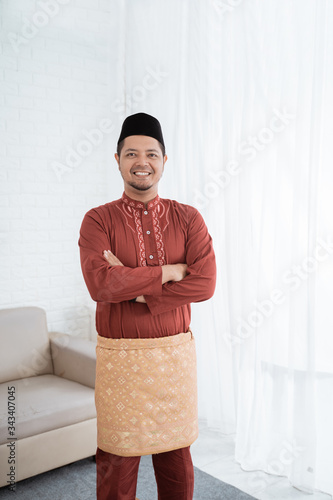 Muslim Male Smile Standing With Crossed Hands Wearing Traditional Malay Clothes Stock Photo Adobe Stock