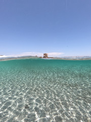 Amazing blue sea with white sand underwater in Sardinia, Stintino, panorama background, ripple water surface with copy space