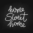 phrase home Sweet home on a black background. Hand lettering typography poster. For housewarming posters, greeting cards, home decorations, interior. Vector chalky illustration for post, print, design