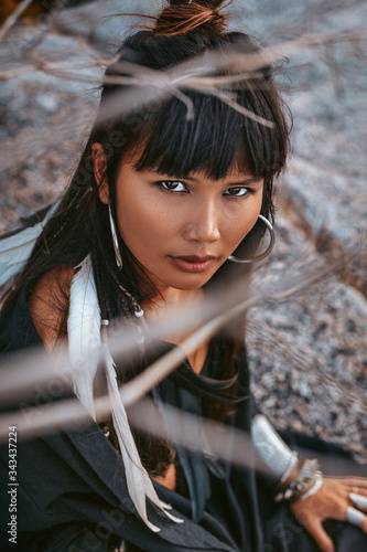 Plakat beautiful young stylish tribal style woman outdoors